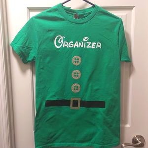 Enjoy an annual tradition!  Santa's Elf "Organizer' t-shirt